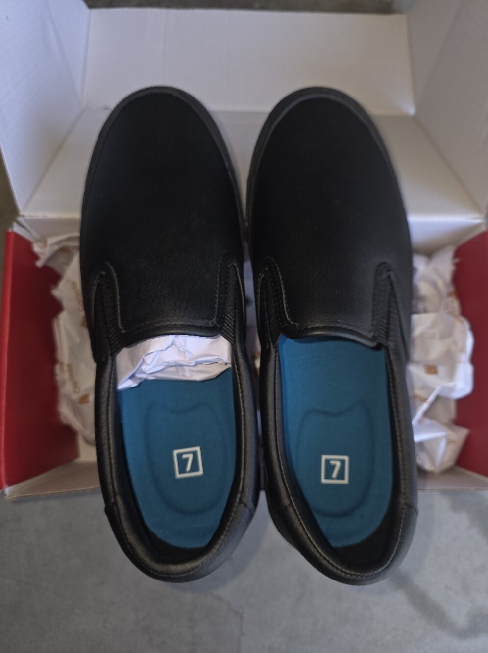 Women’s Slip-On Sneakers in Black with Blue Insole